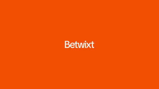 Orange title card displaying the word “Betwixt” in white centered text on a solid orange background.